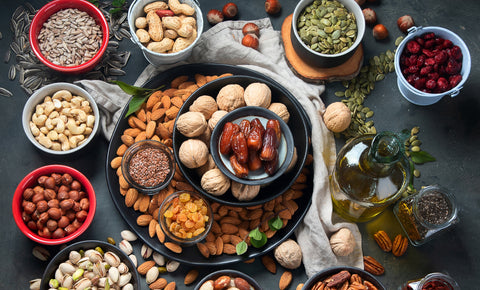 USDA Organic pantry staples including nuts, seeds, dried fruit, beans, and grains.