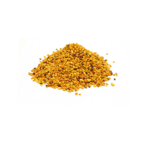 Pile of yellow bee pollen on a white background