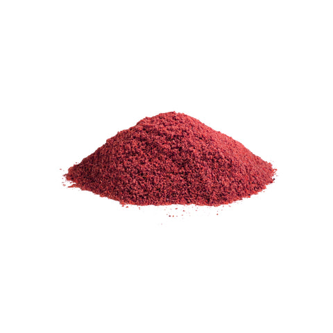 Organic beetroot powder on a white background