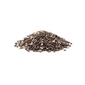 Organic black chia seeds on a white background