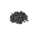 Organic black turtle beans on a white background