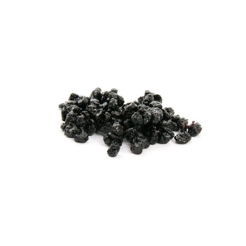 Organic dried blueberries on white background