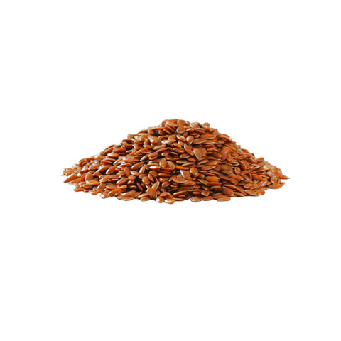 Pile of whole organic flax seeds on a white background