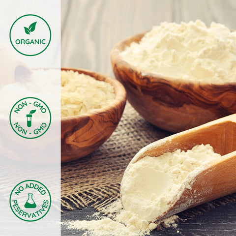 Wooden bowls and scoop filled with brown rice flour