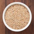 Bowl of organic whole brown sesame seeds