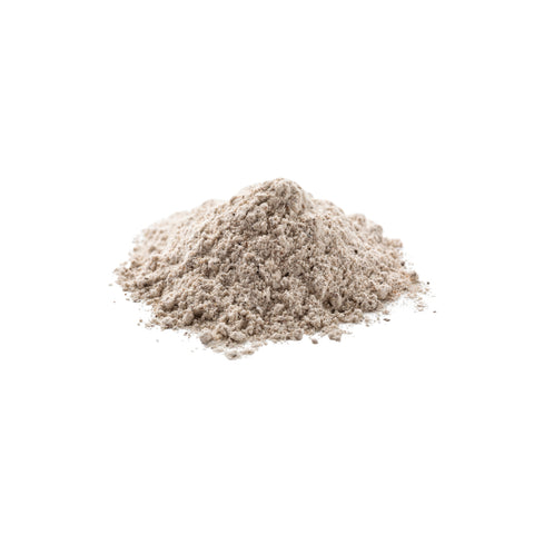 Pile of buckwheat flour on a white background