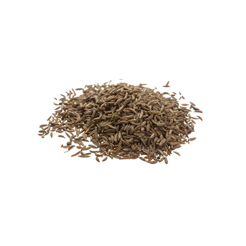 Whole organic caraway seeds on white background
