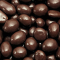 Pile of organic dark chocolate covered almonds