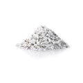 Shredded unsweetened organic coconut pieces on white background