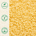 Close-up of organic couscous granules made from durum wheat