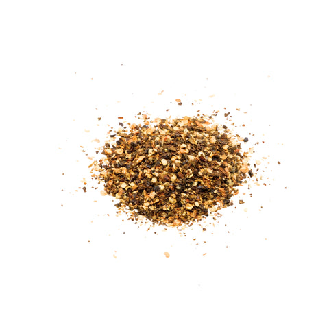 Organic crushed jalapeno pepper on a white background