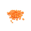 Dehydrated organic diced carrots in vibrant orange color on white background