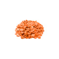 Dehydrated organic diced carrots in vibrant orange color on white background