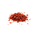 Organic diced red bell pepper on a white background