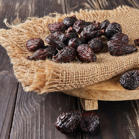 Pile of organic sun-dried black mission figs