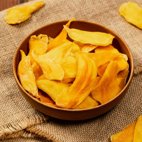 Bowl of organic dried mango slices