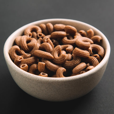 Bowl of organic whole wheat elbow macaroni pasta