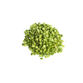 Organic green split peas on a white background