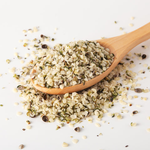 Scoop of organic crushed hemp seeds
