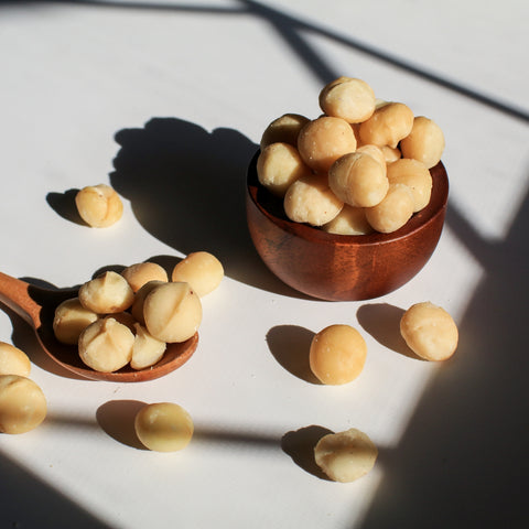 Bowl of raw organic macadamia nuts