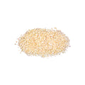 Dried minced organic onion flakes on white background