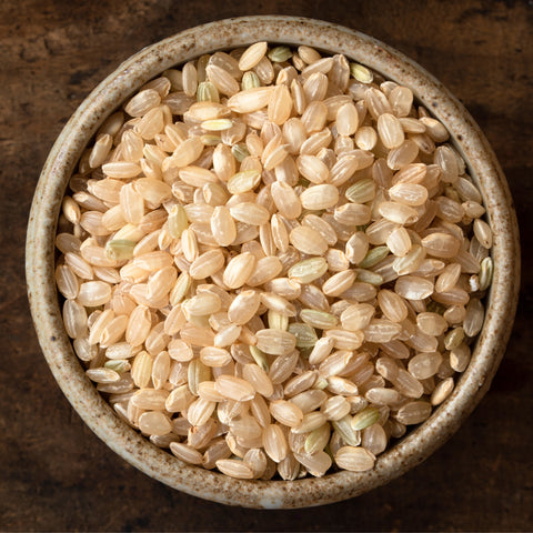 Organic sweet brown rice (mochi rice) in a bowl