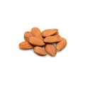 Steam treated organic California almonds on a white background