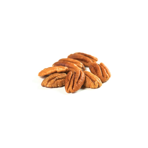 Organic raw pecan halves on a white background