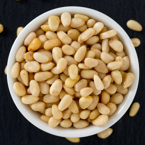 Bowl of organic pine nuts