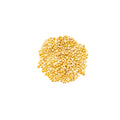 Whole organic proso millet grains with shell on a white background