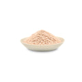 Organic psyllium seed husk in a bowl on a white background