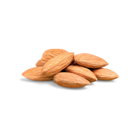 Raw organic almonds on white background