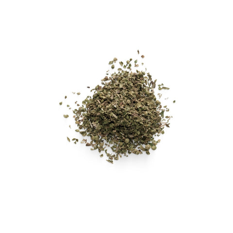 Pile of dried organic rubbed sage on a white background