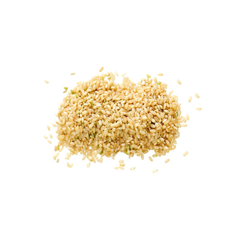 Organic short grain brown rice on a white background