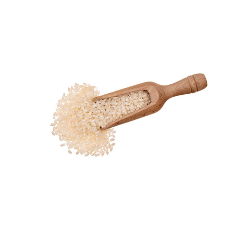 Organic short grain white rice on a white background
