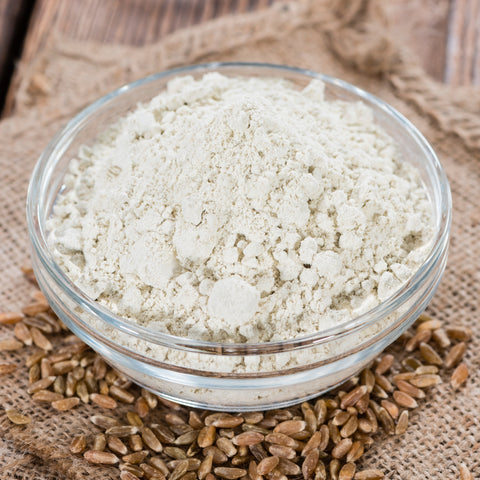 Bowl of organic whole grain spelt flour