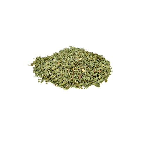 Chopped organic tarragon leaf on a white background