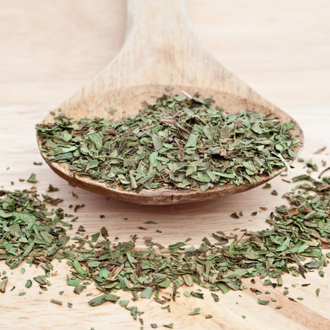 Spoonful of chopped organic tarragon leaf