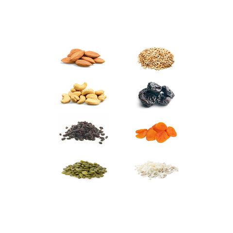 Organic trail mix with nuts, seeds, and dried fruit on white background
