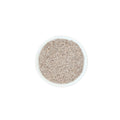 Organic white chia seeds on a white background
