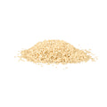 Organic hulled white sesame seeds on a white background