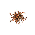 Organic whole cloves on white background