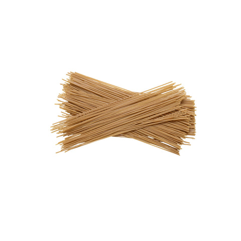 Organic whole wheat spaghetti pasta on a white background