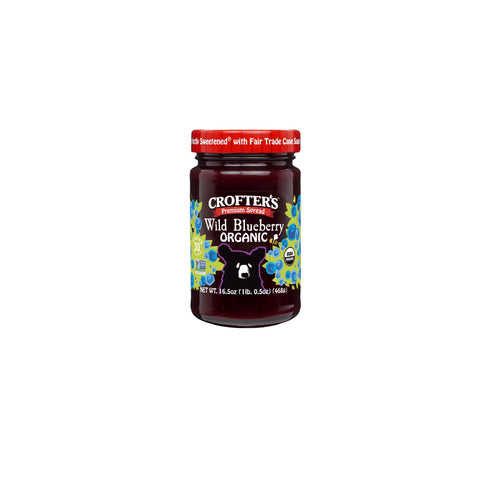 Organic wild blueberry fruit spread on a white background