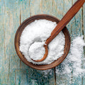 natural sea salt wooden in bowl with spoon in the bowl