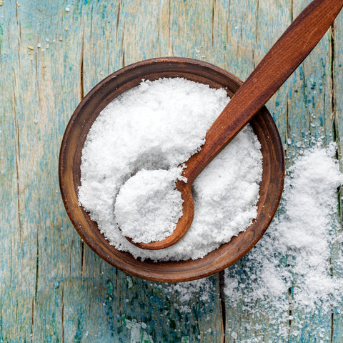 natural sea salt wooden in bowl with spoon in the bowl